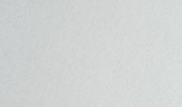 istock Blank paper on a flat surface in a well-lit room 2251436822