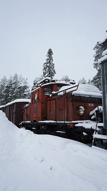 istock Vintage locomotive in winter 2251443453