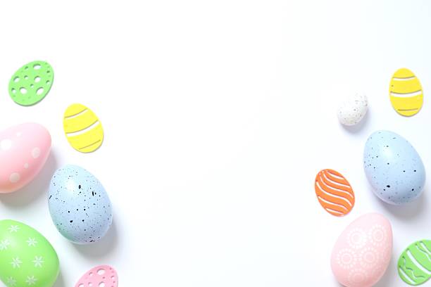 Happy Easter. Colorful eggs on white background, space for text or advertising