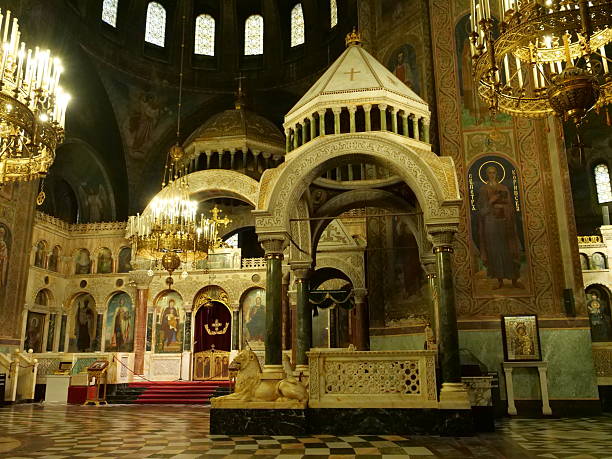 istock Interior of Alexander Nevsky Cathedral, Sofia, Bulgaria, showcasing ornateOrthodox architecture with a brass chandelier, marble baldachin, 2251452045
