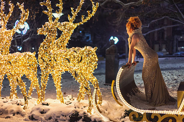 Christmas fantasy portrait of young beautiful woman
