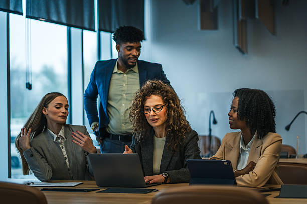 istock Diverse business team collaborating on laptop during office meeting 2251454174