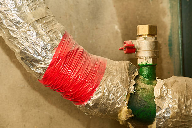istock Isolated water supply.Valve shutting,pipes wrapped in basement 2251457015