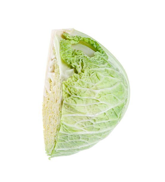 istock Piece of fresh Savoy cabbage isolated on white 2251463487