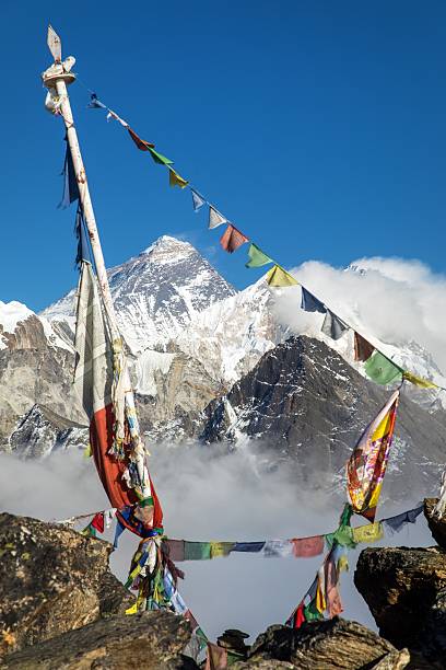 istock Mount Everest Lhotse peak buddhist prayer flags mountain 2251467552