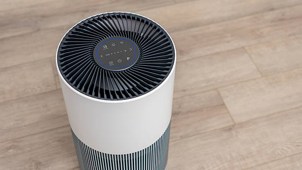 istock Modern air filter device on wooden floor, showcasing sleek design and control panel, enhancing indoor air quality and comfort in living spaces 2251467658