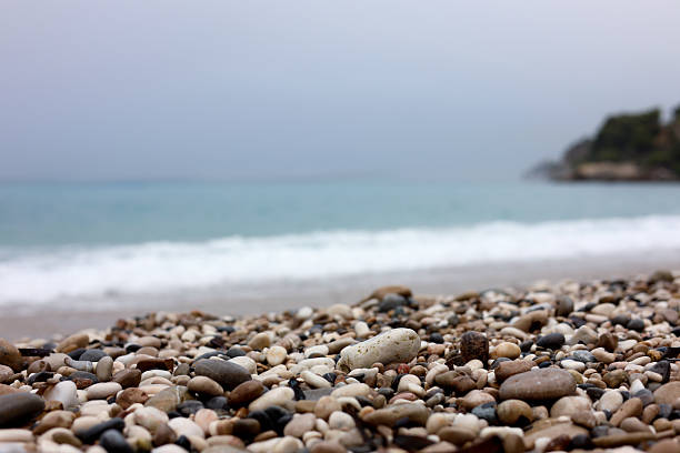 Beautiful sea and pebbles on beach, selective focus