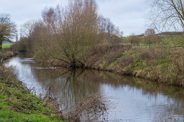 istock River Bochoter AA flowing through rural winter landscape 2251476762