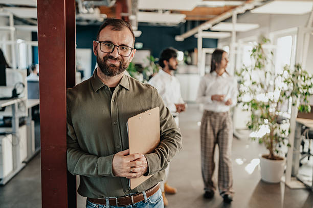 istock Team collaboration in a modern office space in Berlin with diverse coworkers engaging in work activities 2251476868