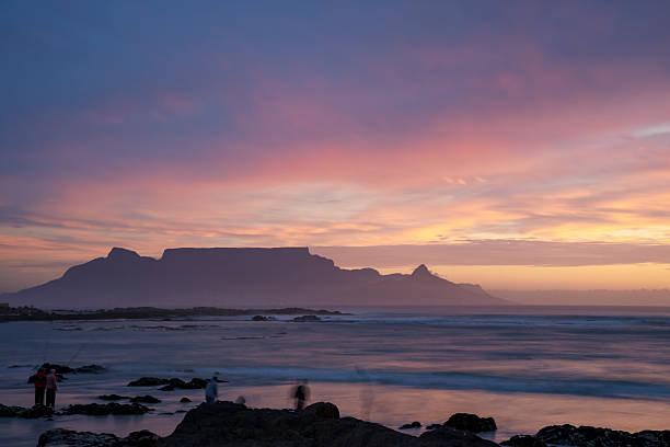 Cape Town Sunset Aerial View from Table Mountain over Camps Bay, Lion's Head and Twelve Apostles in the Background, South Africa
