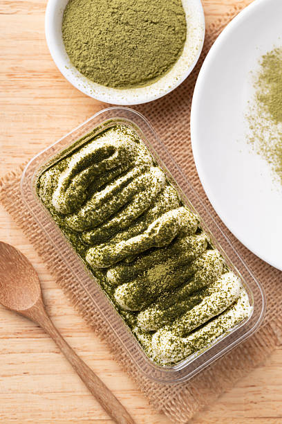 Matcha Tiramisu cake with green tea powder on top