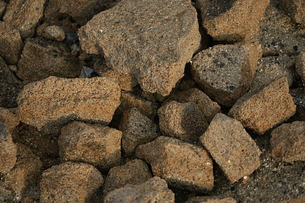 A close-up view of a pile of rugged brown rocks