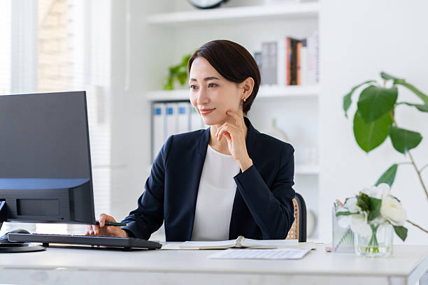 istock Middle-aged businesswoman working in the office 2251485197