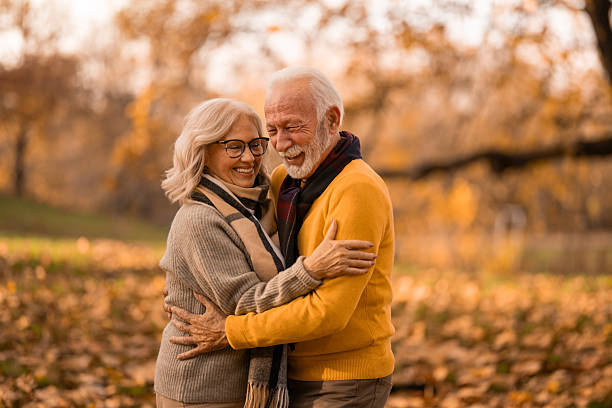 istock Beautiful senior couple embracing in nature. 2251490590