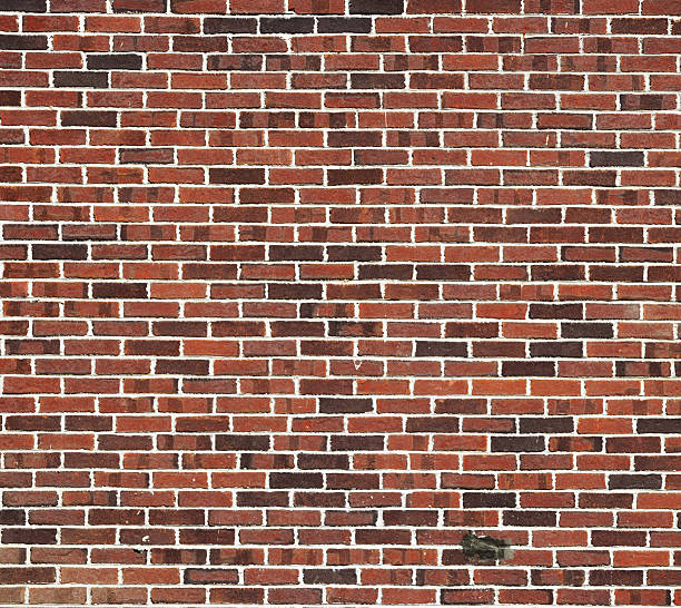 istock facade view of old brick wall background 2251492596