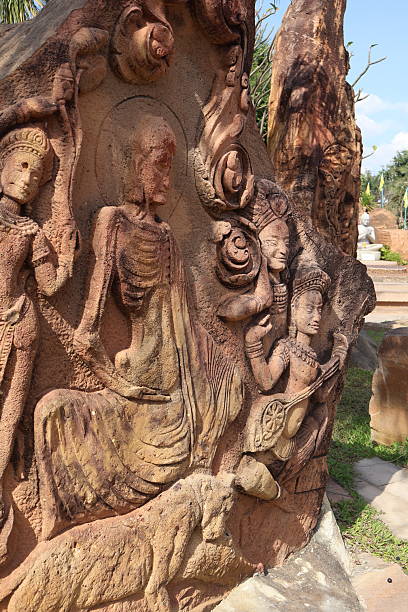 A large rock carving in an outdoor setting