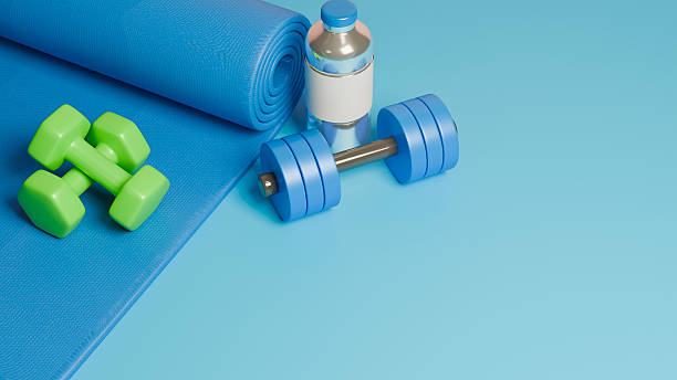 istock 3D rendered workout equipment for training at home on blue background, Top view 2251495352