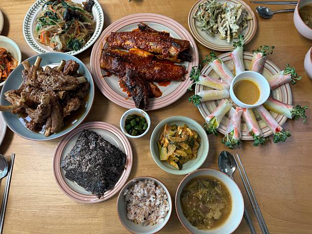 istock Abundant Korean Dinner Table Spread with Main Dishes and Banchan 2251500379