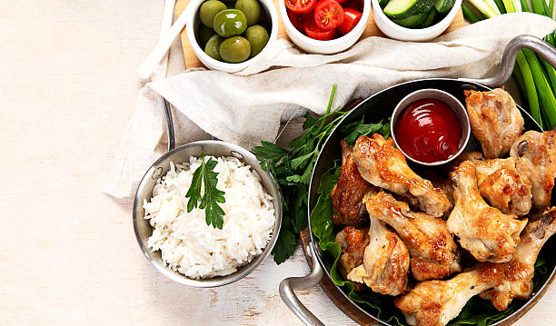 istock Grilled chicken wings with salt, spices and herbs. 2251502076