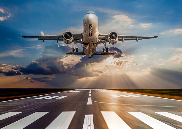istock Passenger airplane taking off at sunset 2251502298
