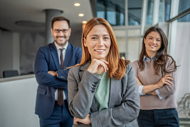 istock Confident business team standing in modern office 2251503718