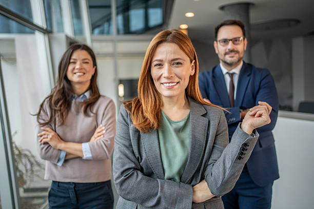 istock Confident business team standing in modern office 2251503722