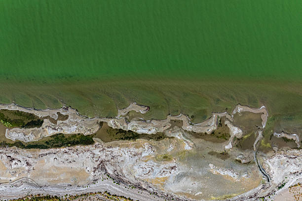 istock Dangers and droughts affecting lakes,Abstract photography, backgrounds for billboards, global climate-themed photographs. The magical beauty of colors. The colors and patterns of lakes and rivers. 2251507024