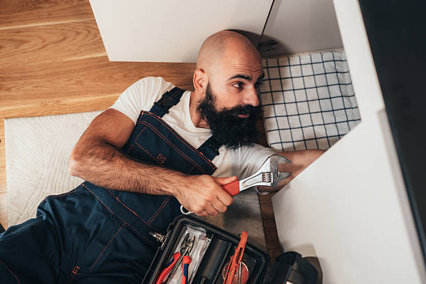 istock Reliable home service: kitchen repair in progress 2251511819