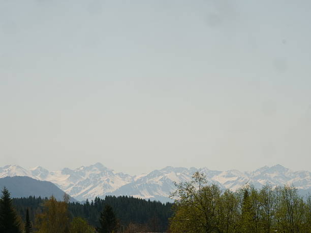 istock Mountain range is visible in the distance with a clear blue sky 2251512476
