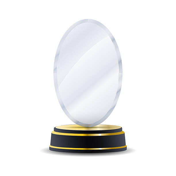 istock Crystal winner trophy with gold first-place badge, transparent polished surface, and laurel wreath engraving ideal for contest results, business awards, academic achievements, and prestige vector compositions 2251512631