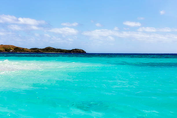 Fiji sand deposit emerald water