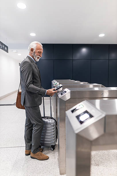 istock Professional Traveler Using Automated Checkpoint at Modern Airport Lounge 2251514265
