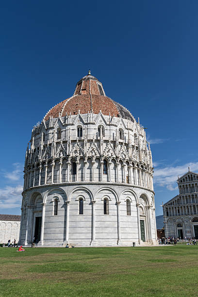 Baptistery of Pisa, one of the monumental buildings in the famous Piazza dei Miracoli, formally known as Piazza del Duomo, listed as a UNESCO World Heritage Site since 1987
