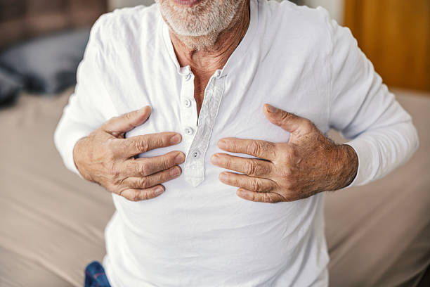 istock Senior man experiencing chest pain holding chest 2251518431