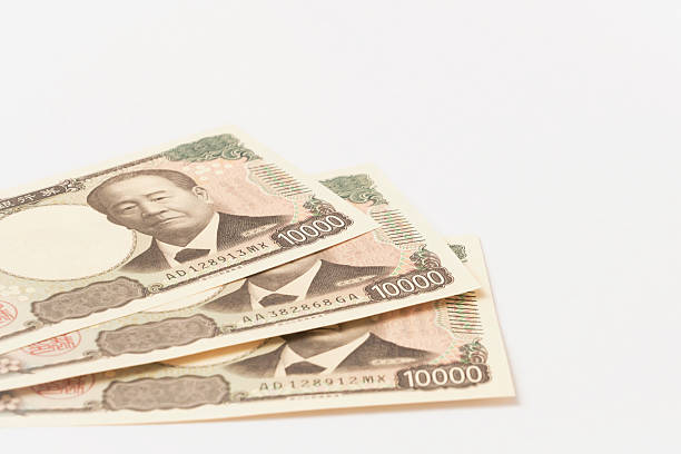 istock Japanese banknotes placed on a white background 2251520667
