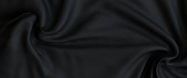 istock Two abstract dark fabric backgrounds featuring luxurious black silk texture, subtle vertical lines, and elegant swirling, draped, and folded patterns. 2251522634