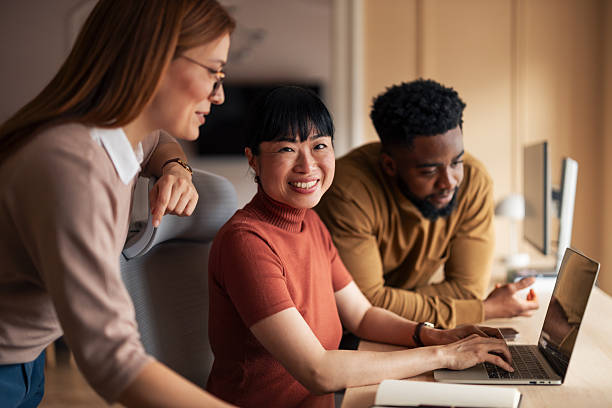 istock Multiracial Team Collaborating in Modern Office Environment 2251522910