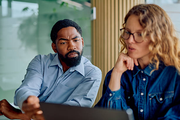 istock Diverse colleagues collaborating on project in office meeting 2251534262