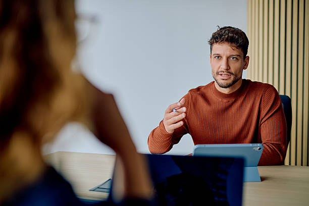 istock Man talking during job interview or business meeting 2251535917