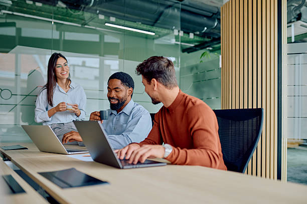 istock Diverse business team collaborating in modern office meeting 2251536053