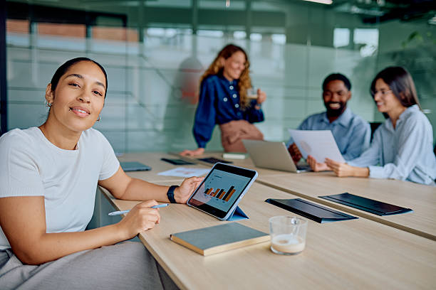 istock Diverse business team collaborating in a modern office meeting 2251536133