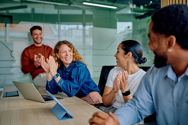 istock Diverse business team applauding successful meeting celebration 2251536781