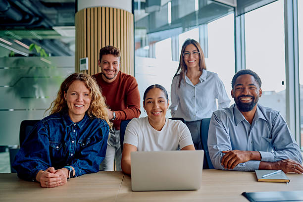 istock Diverse business team smiling during office meeting 2251536782