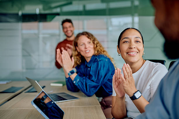 istock Business team applauding successful presentation in office 2251536790