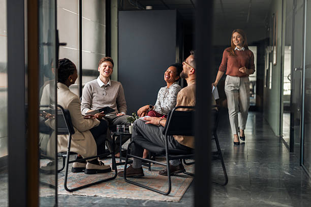 istock Team Collaborates in a Modern Office, Sharing Ideas and Laughter 2251537080