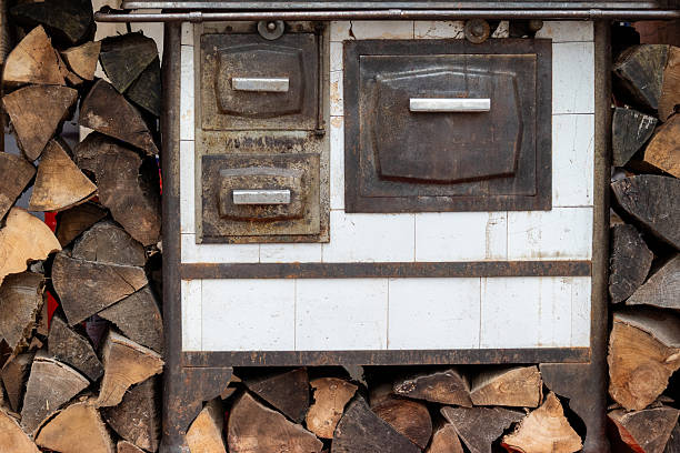 Old Wood Burning Stove With Firewood
