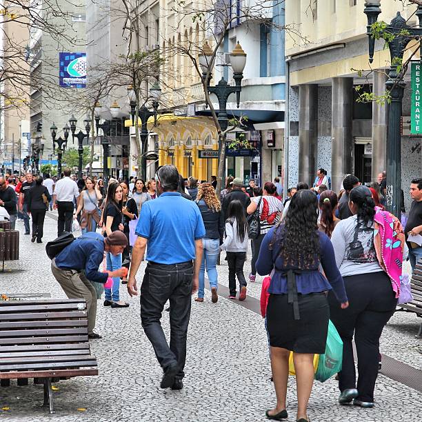 People shop at Avenida Luiz Xavier in Curitiba, Brazil. Curitiba is the 8th most populous city of Brazil with 1.76 million inhabitants.