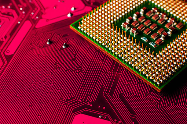 istock Macro photo of computer or laptop CPU microprocessor processor. Close-up of metallic pins and PCB of computer processor. Semiconductors, pins and connectors 2251541163