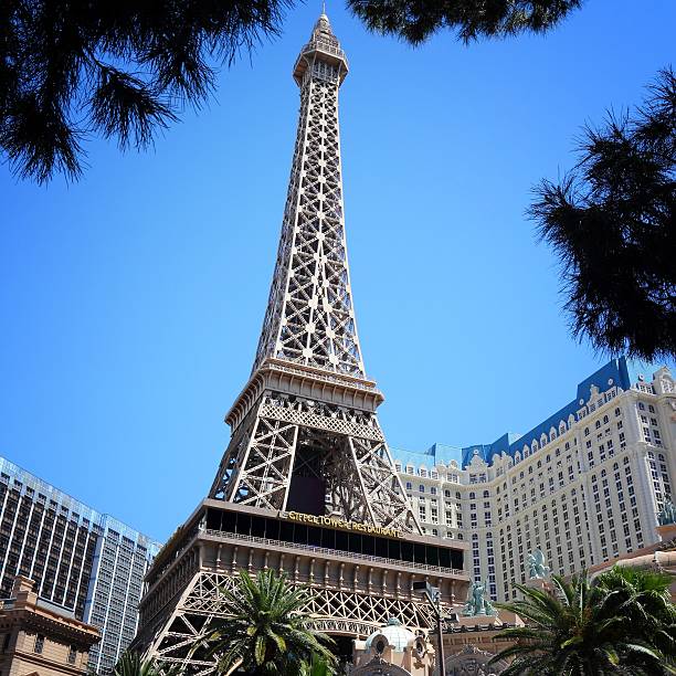 People visit Paris Las Vegas casino hotel in Las Vegas. The hotel is among 30 largest hotels in the world with 2,916 rooms.