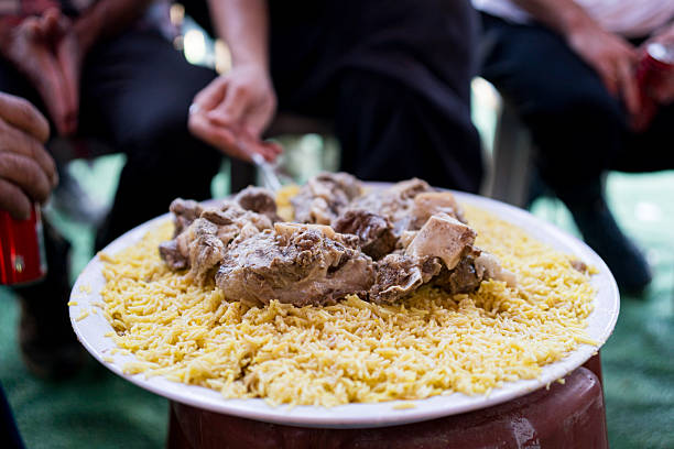 Savory arab mansaf dish with lamb pieces over rice. A traditional Middle Eastern food.